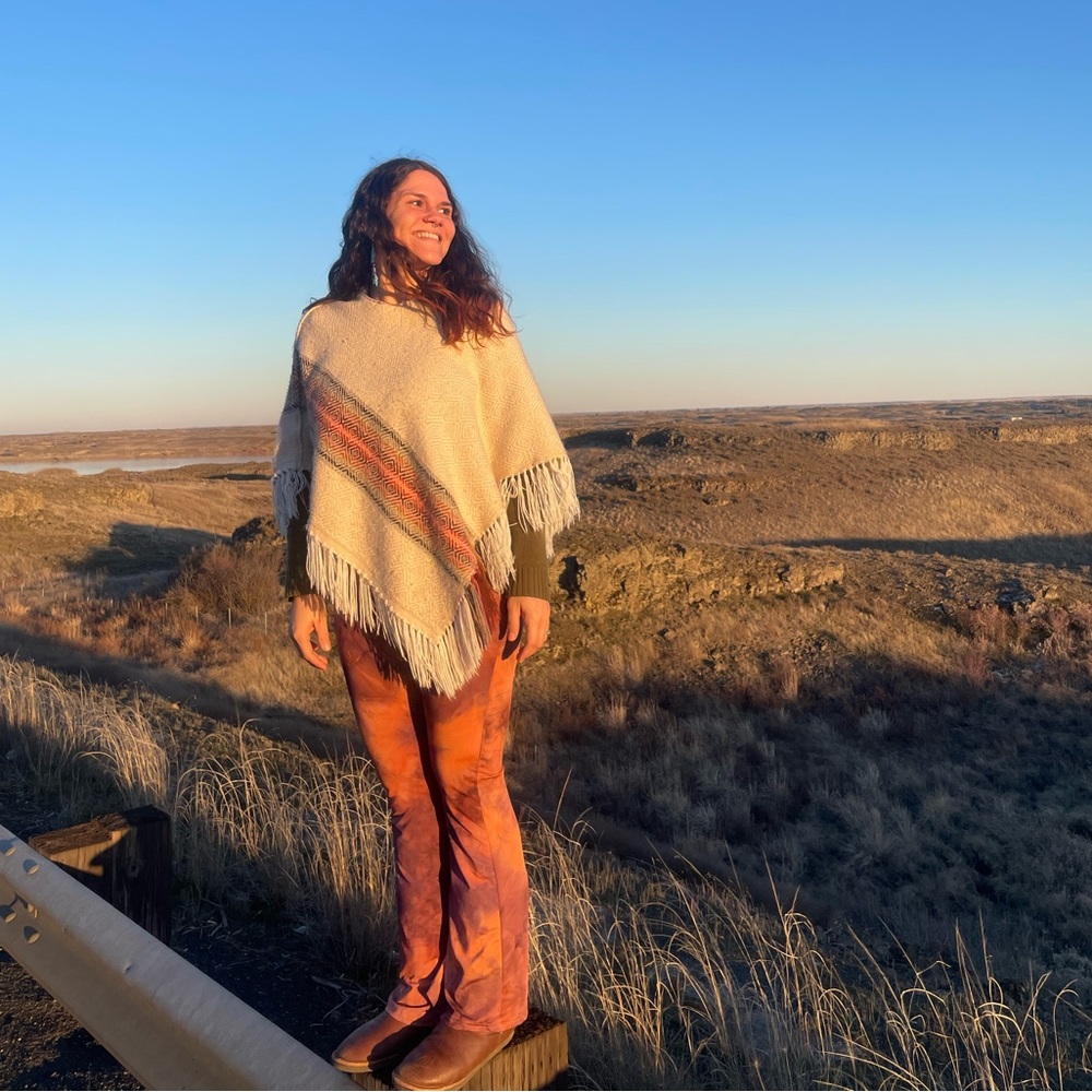 Elegant Cream Poncho with Fringe